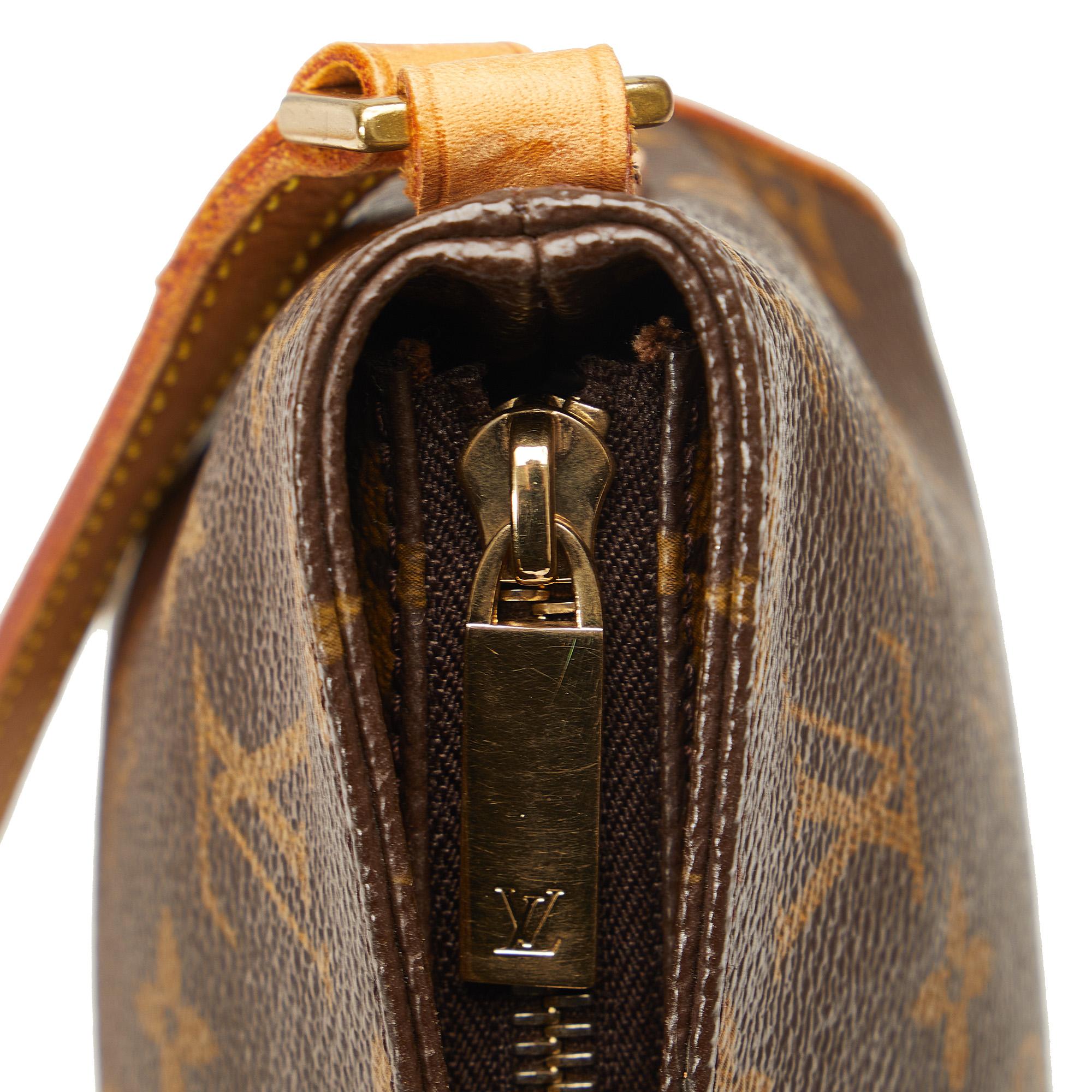 Louis Vuitton Monogram Trotteur (SHG-kxxeIY)