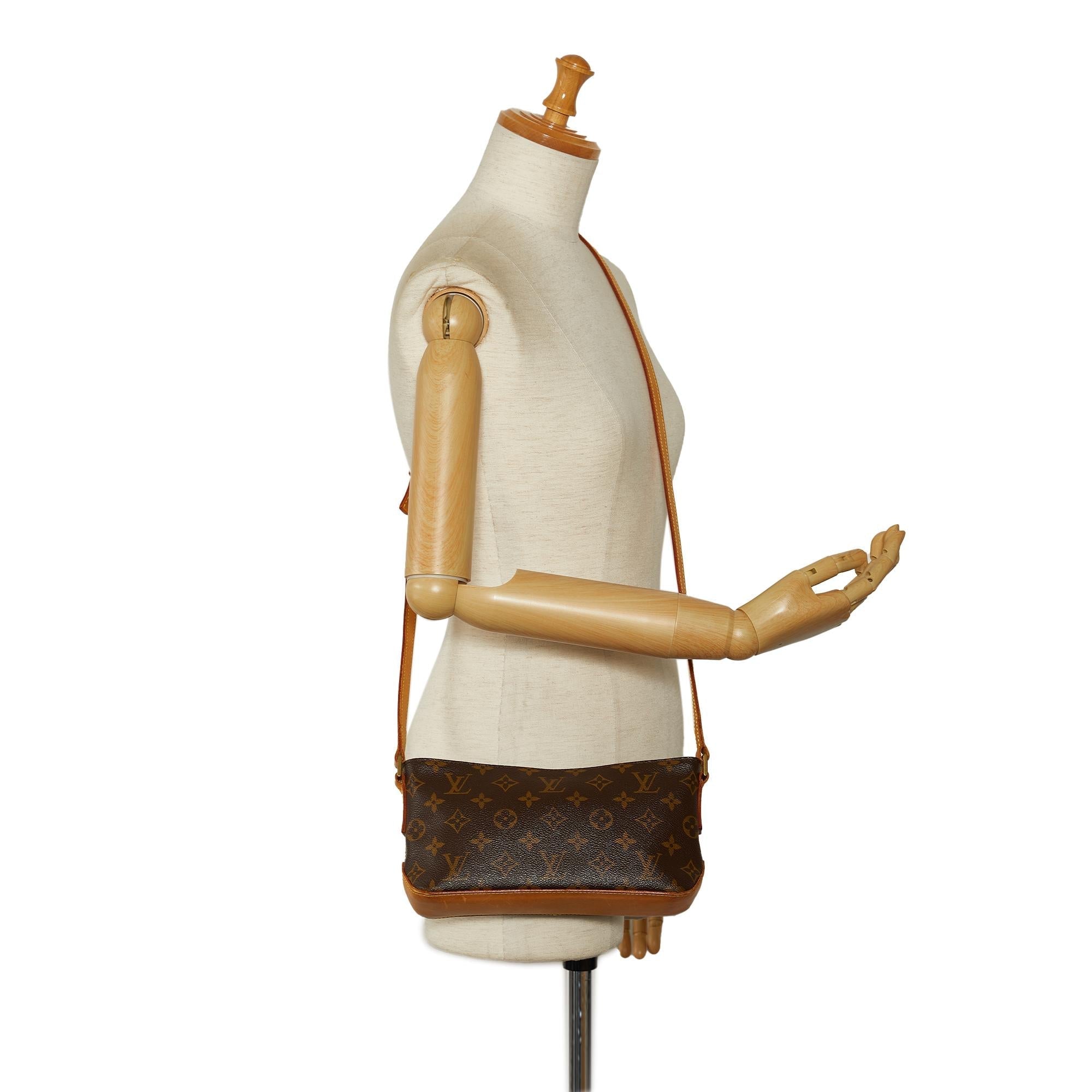 Louis Vuitton Monogram Trotteur (SHG-kxxeIY)