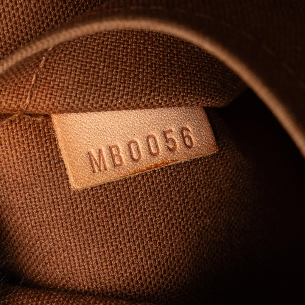 Louis Vuitton Monogram Tulum GM (SHG-14w7Ut)
