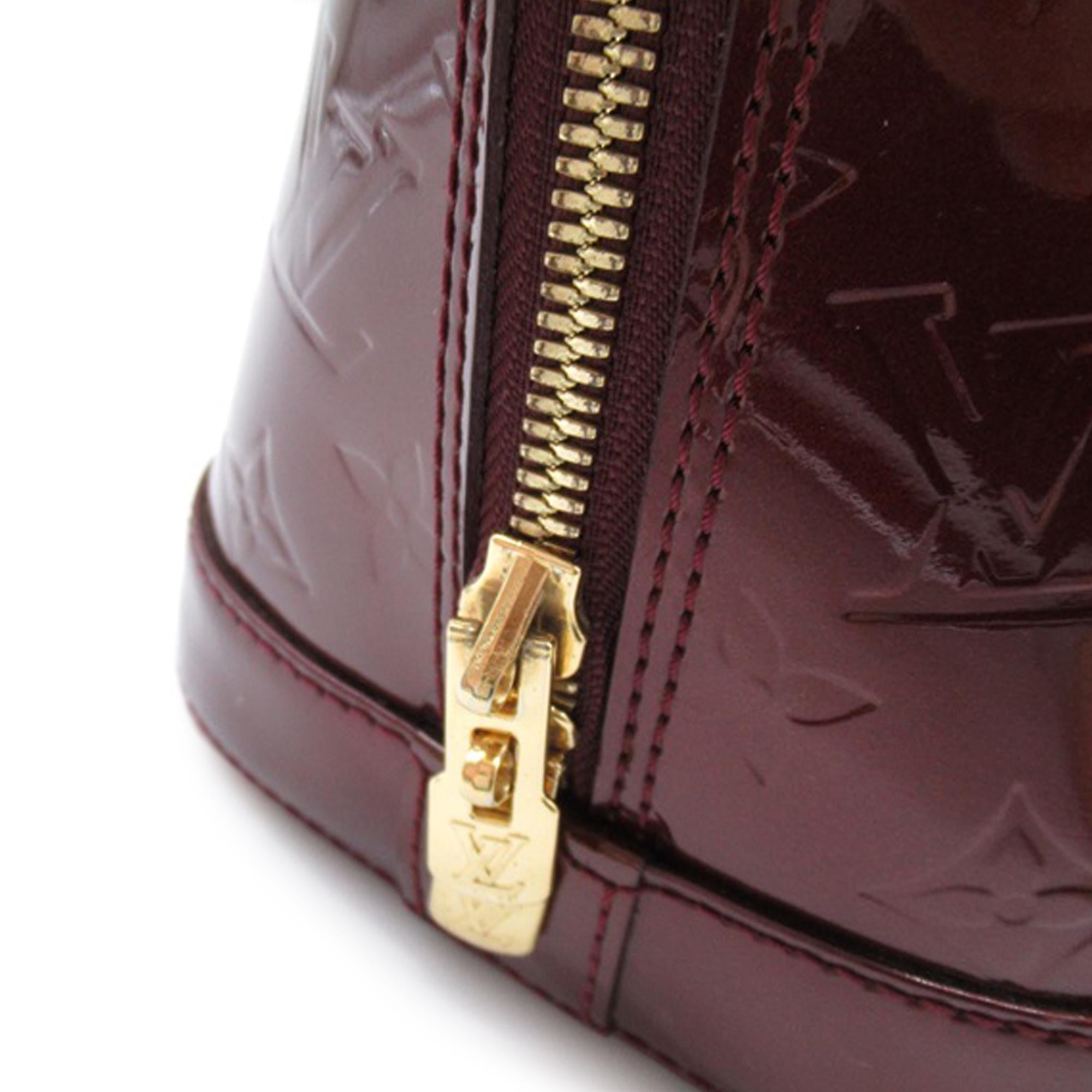 Louis Vuitton Monogram Vernis Alma PM (SHG-6sE6J2)