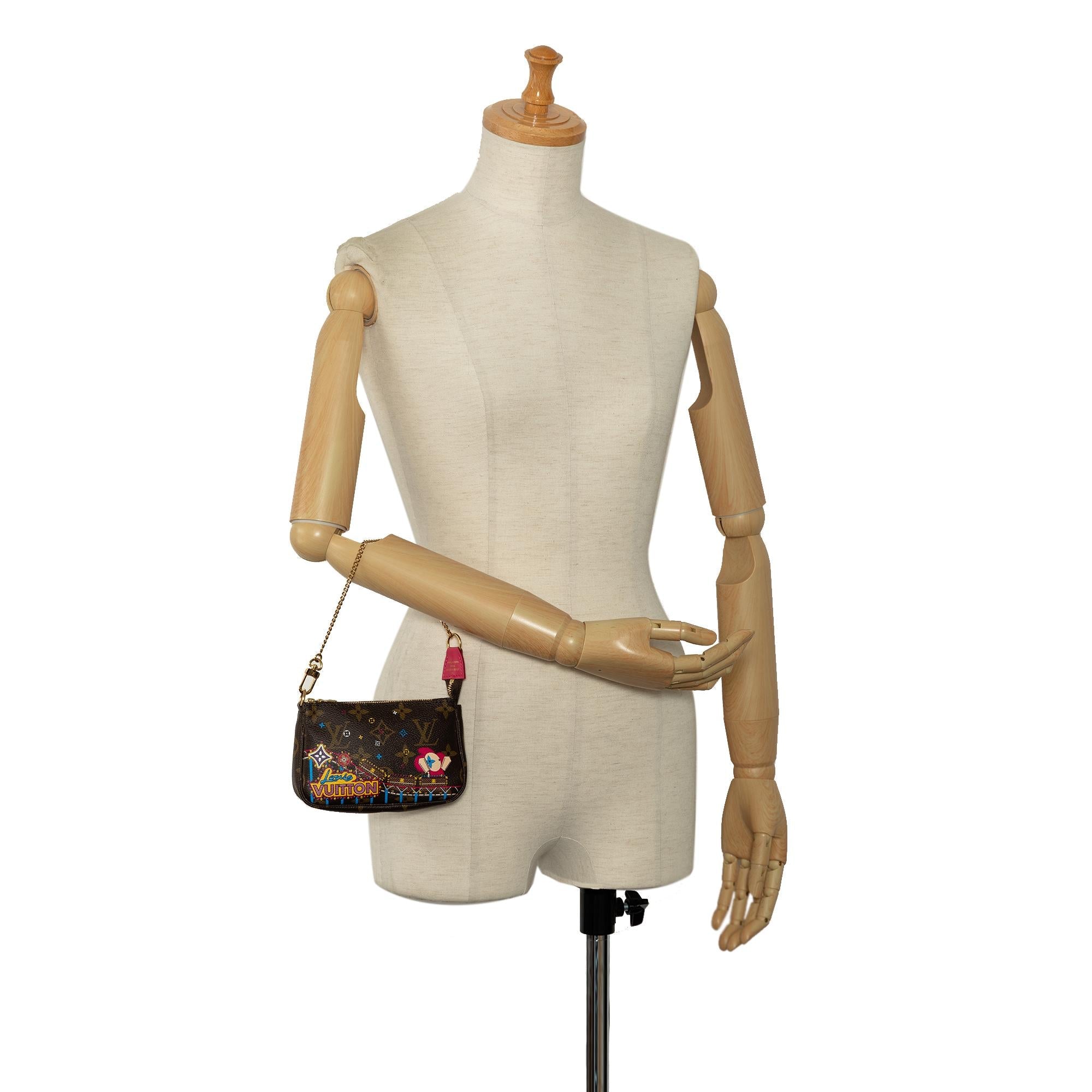 Louis Vuitton Monogram Vivienne Christmas Print Mini Pochette Accessoires (SHG-29g7ZR)