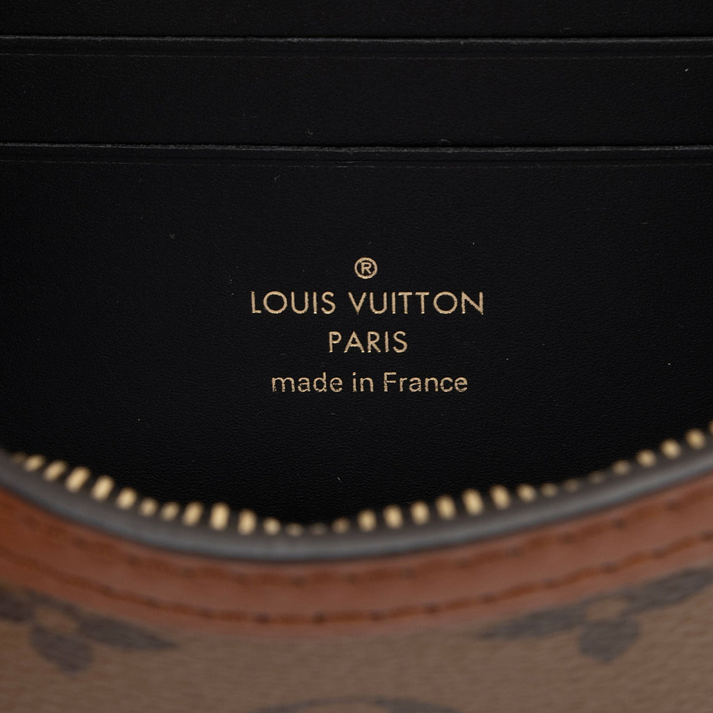 Louis Vuitton Reverse Monogram Dauphine Chain Wallet (SHF-BmrxyO)