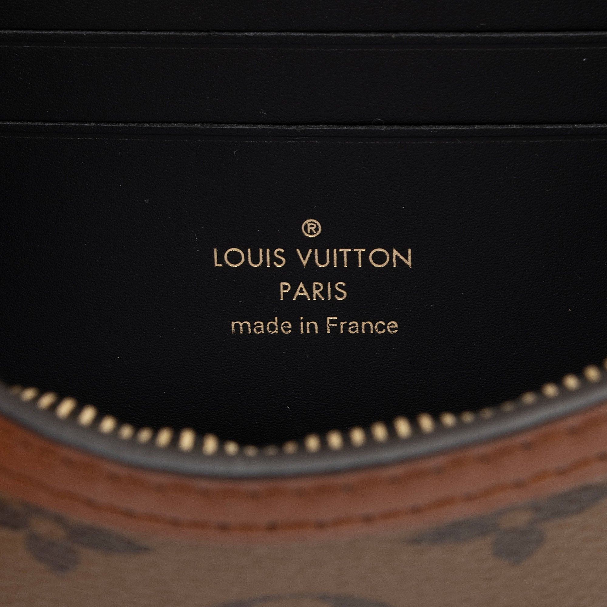 Louis Vuitton Reverse Monogram Dauphine Chain Wallet (SHF-BmrxyO)
