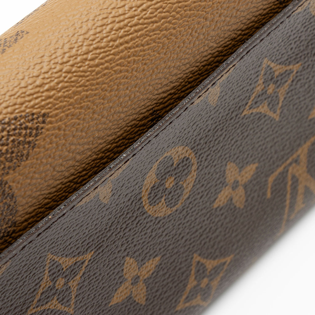 Louis Vuitton Reverse Monogram Sarah Wallet (SHF-bwfRff)