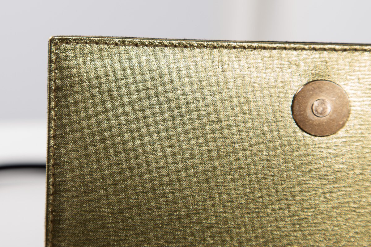 Paloma Picasso Black & Gold Embossed Suede Clutch