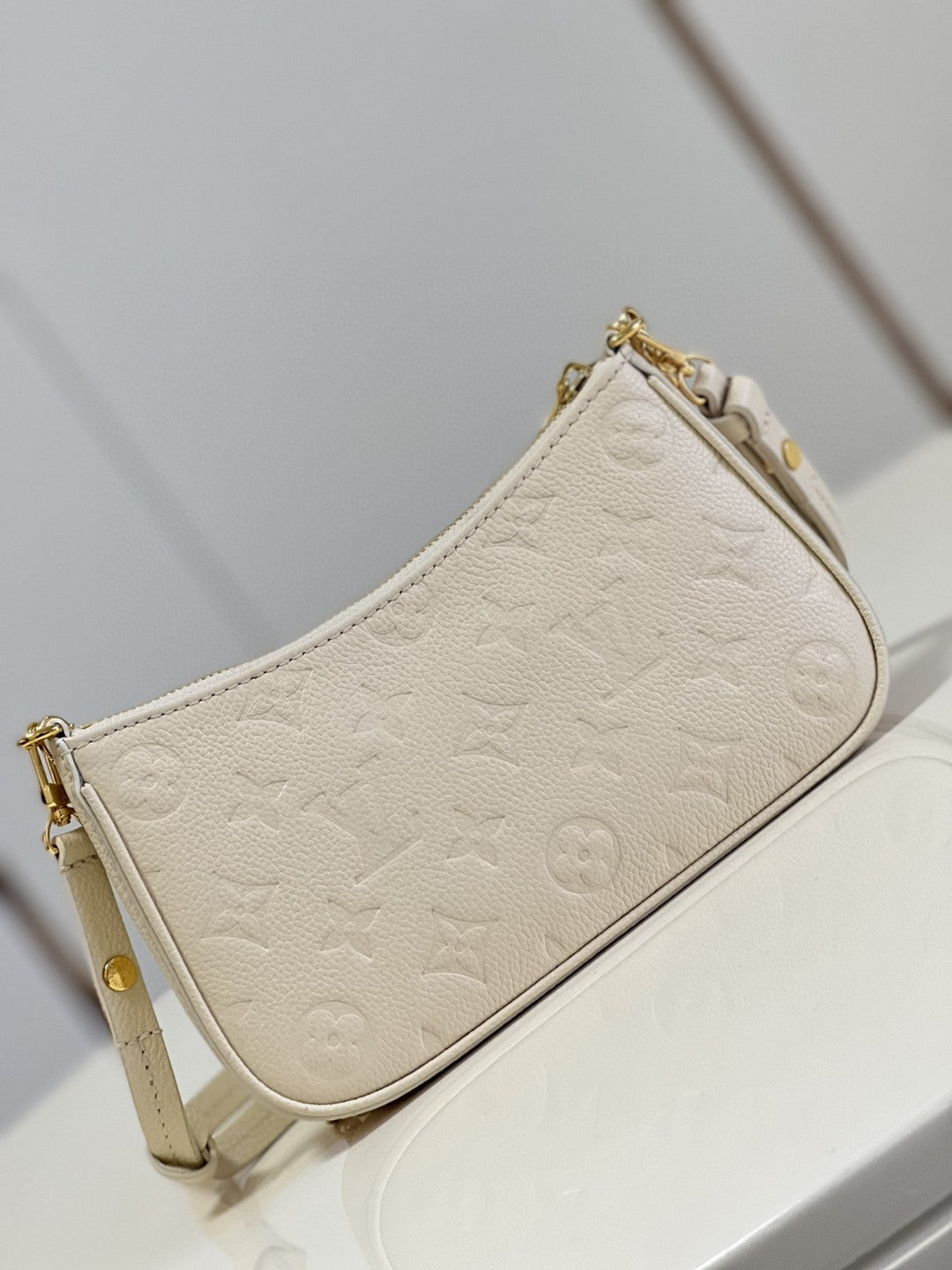 Louis Vuitton Easy Pouch On Strap Monogram Empreinte CrÃƒÆ’Ã‚Â¨me White For Spring, WomenÃƒÂ¢Ã¢â€šÂ¬Ã¢â€žÂ¢s Handbags, Shoulder Bags 7.5in/19cm Louis Vuitton M81066