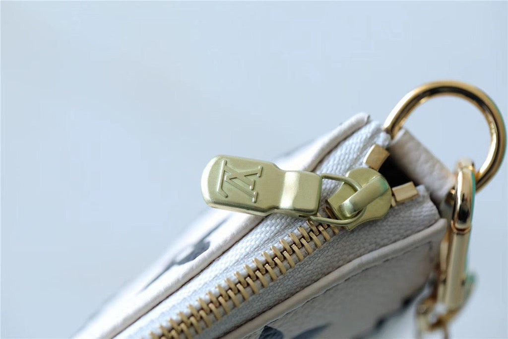 Louis Vuitton Mini Pochette AcGLAMIssoires Monogram Empreinte White For Women, WomenÃƒÂ¢Ã¢â€šÂ¬Ã¢â€žÂ¢s Handbags, Shoulder Bags And Crossbody Bags 6.1in/15.5cm Louis VuittonÃƒâ€šÃ‚Â 