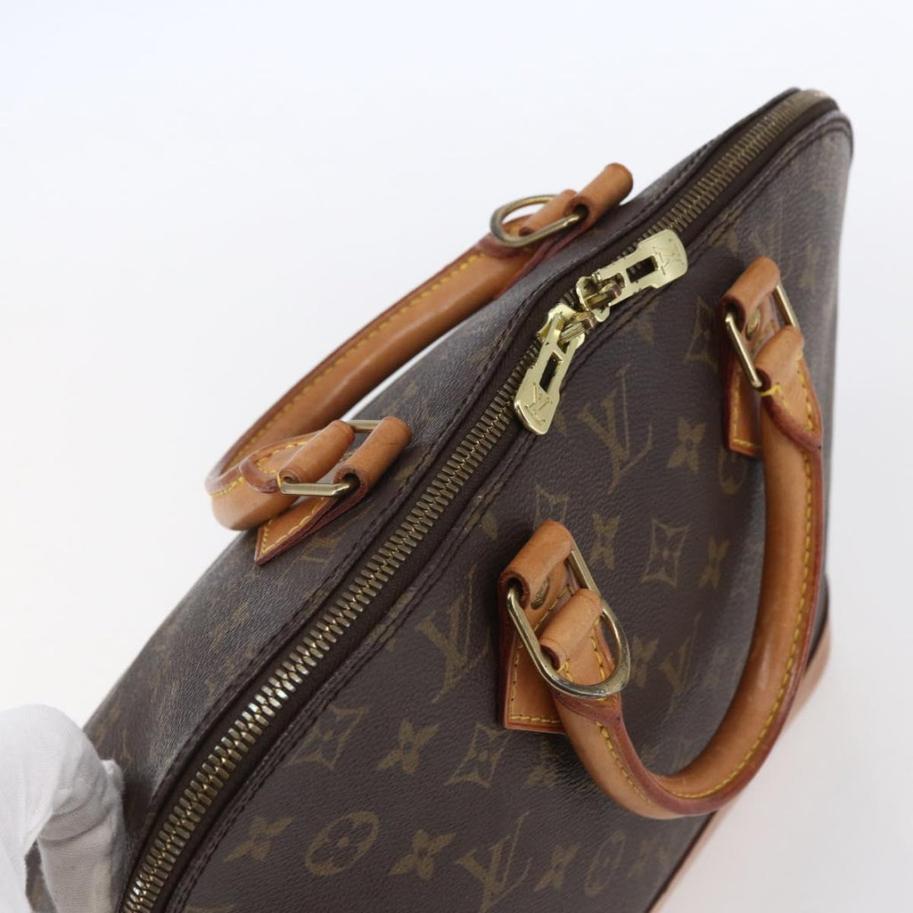 Louis Vuitton Alma Handbag Monogram Canvas Brown Canvas Handbag