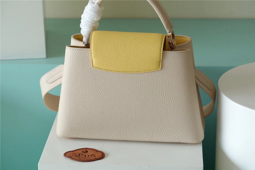 Louis Vuitton Capucines BB Taurillon Creme Beige/ Plume Yellow Berlingot For Women, Women’s Bags, Shoulder And Crossbody Bags 10.6in/27cm Louis Vuitton