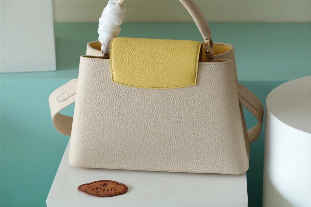 Louis Vuitton Capucines Taurillon Creme Beige/ Plume Yellow Berlingot For Women, WomenÃƒÂ¢Ã¢â€šÂ¬Ã¢â€žÂ¢s Bags, Shoulder And Crossbody Bags 10.6in/27cm Louis Vuitton