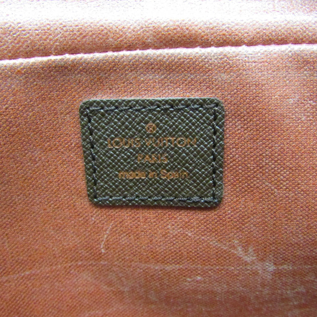 Louis Vuitton Trousse De Toilette  Canvas Clutch Bag