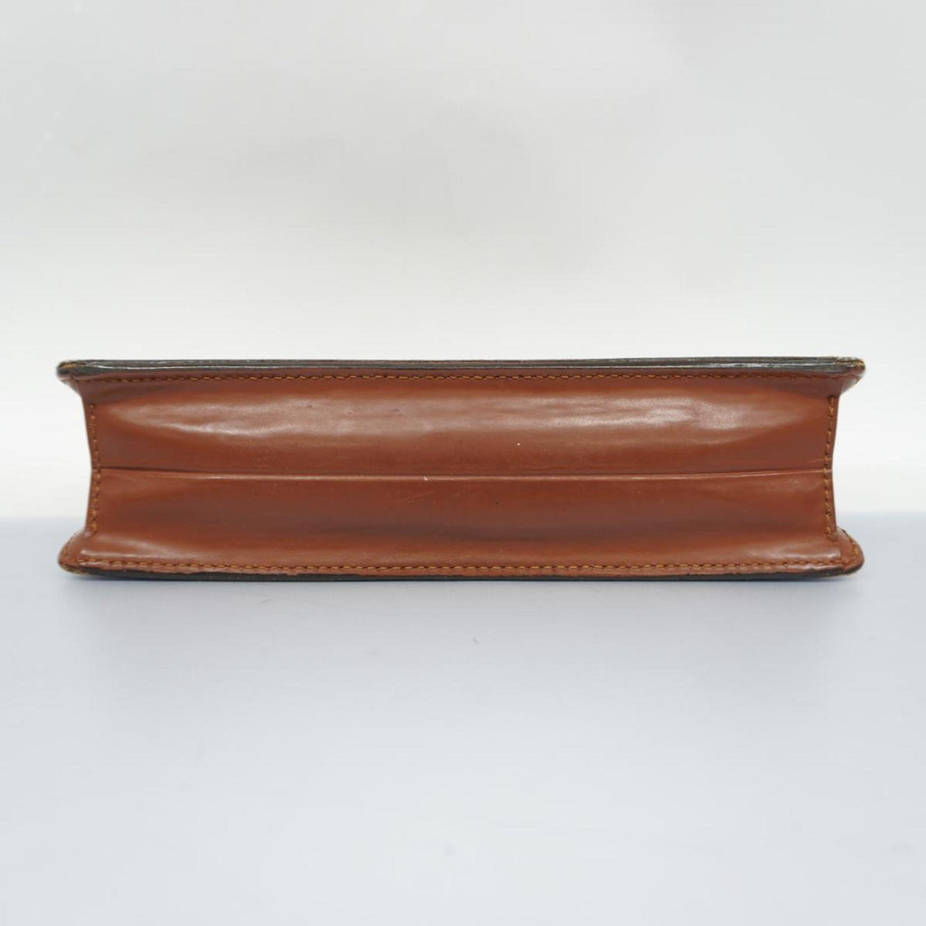 Louis Vuitton Trousse De Toilette  Canvas Clutch Bag