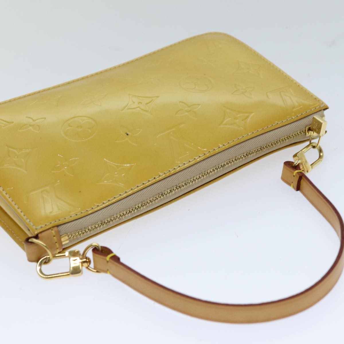 Louis Vuitton Lexington   Leather Clutch Bag