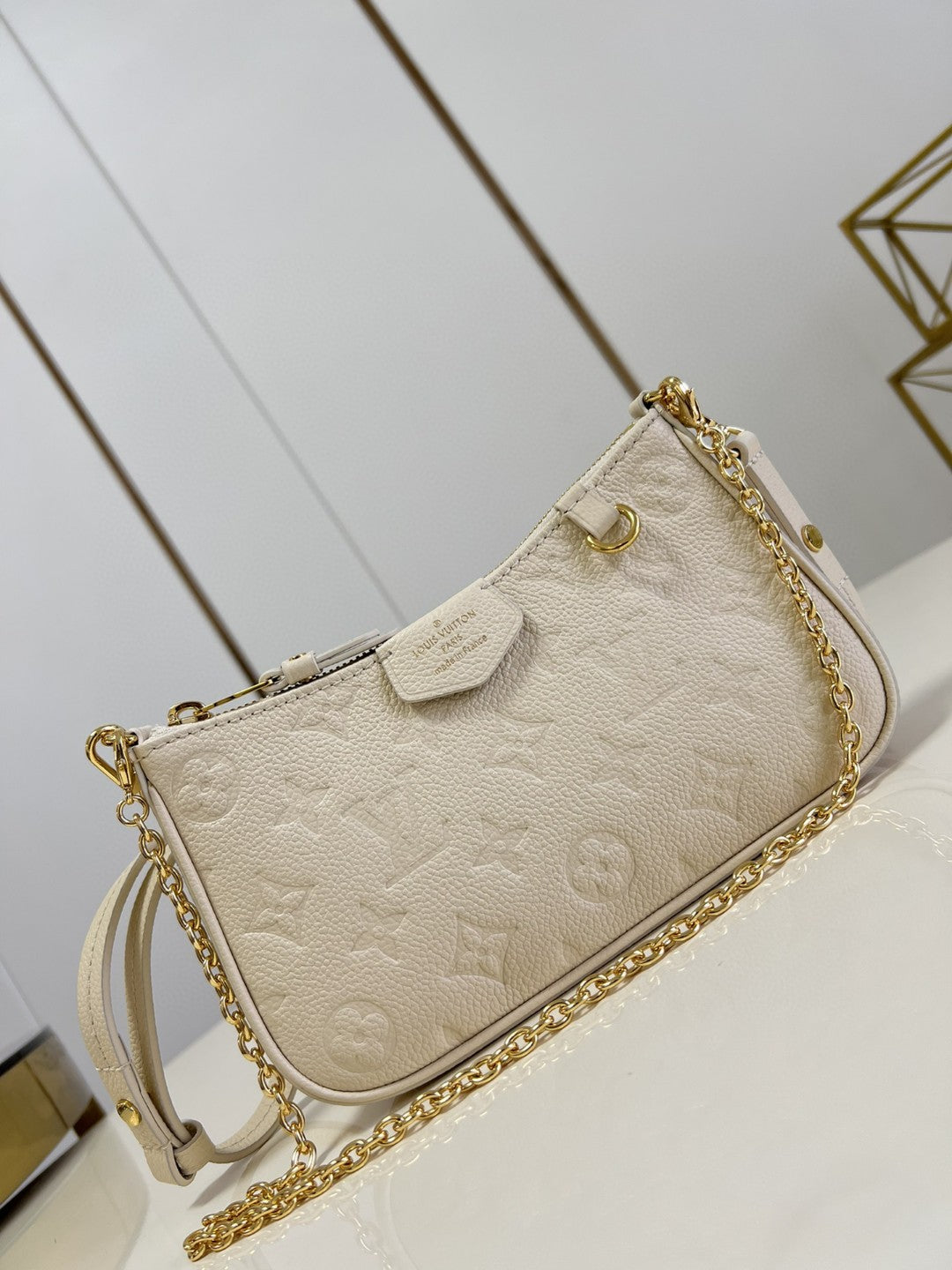 Louis Vuitton Easy Pouch On Strap Monogram Empreinte CrÃƒÆ’Ã‚Â¨me White For Spring, WomenÃƒÂ¢Ã¢â€šÂ¬Ã¢â€žÂ¢s Handbags, Shoulder Bags 7.5in/19cm Louis Vuitton M81066