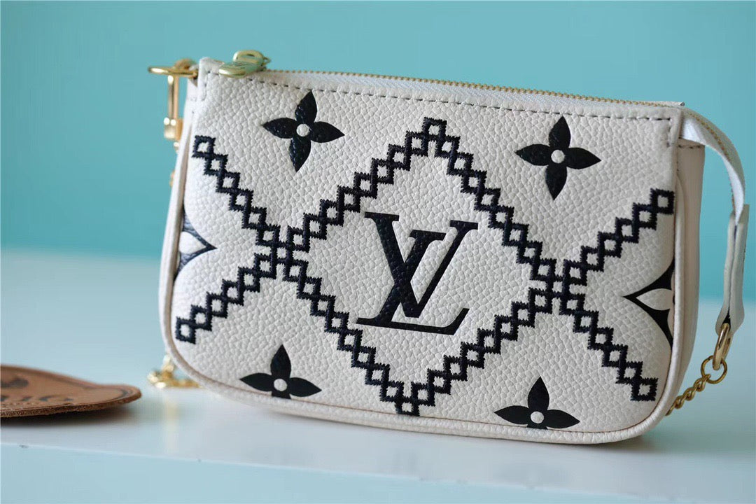 Louis Vuitton Mini Pochette AcGLAMIssoires Monogram Empreinte White For Women, WomenÃƒÂ¢Ã¢â€šÂ¬Ã¢â€žÂ¢s Handbags, Shoulder Bags And Crossbody Bags 6.1in/15.5cm Louis VuittonÃƒâ€šÃ‚Â 