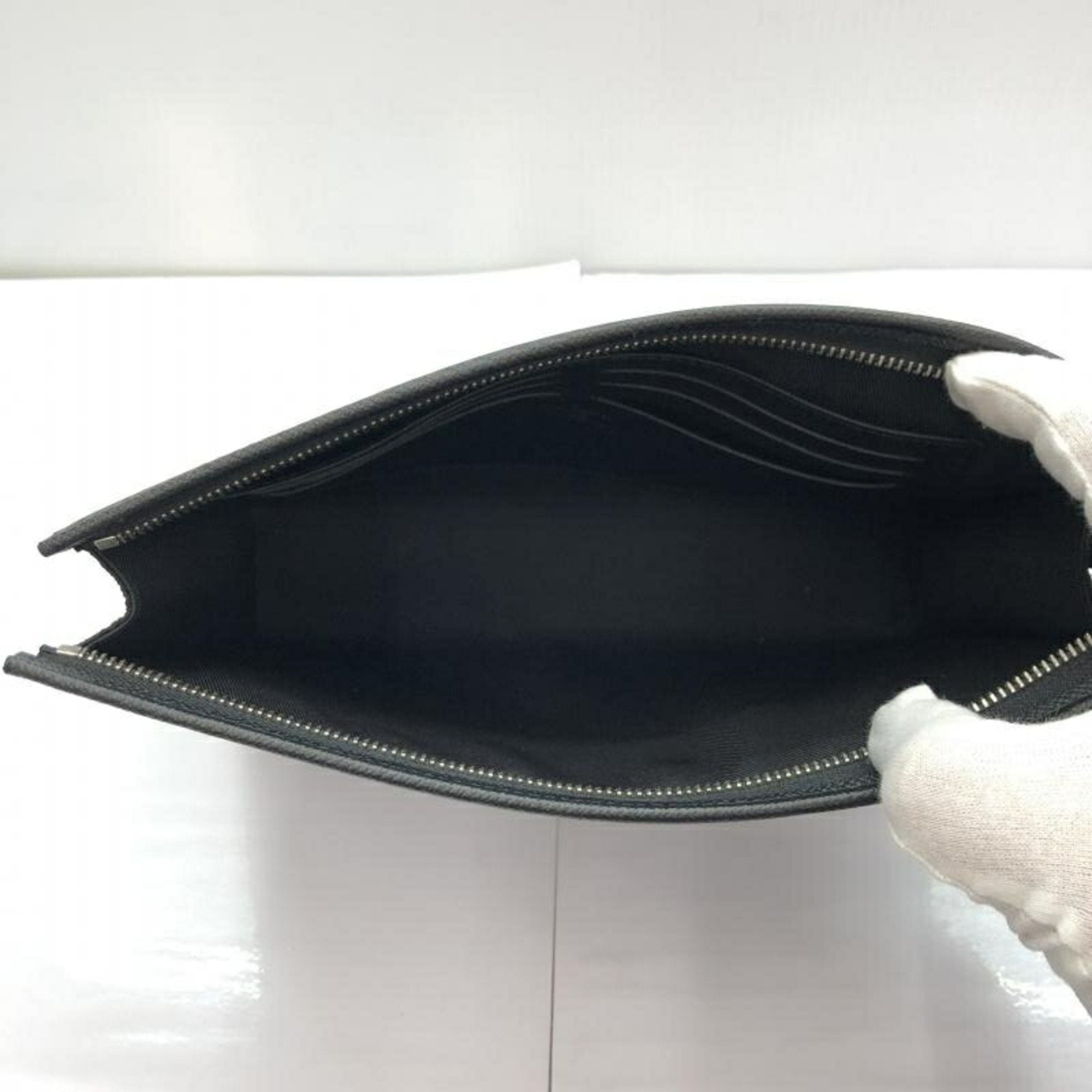 Louis Vuitton Pochette Voyage  Leather Clutch Bag