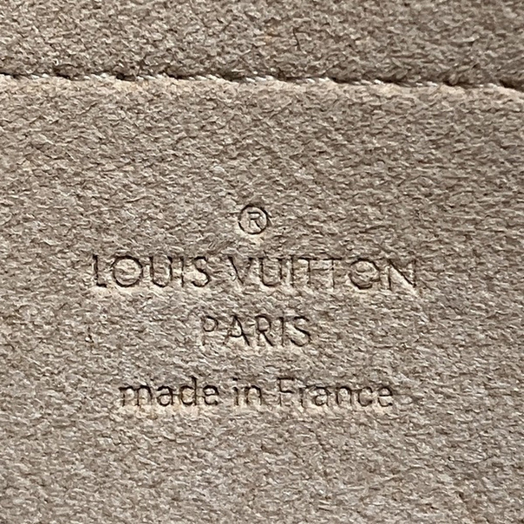 Louis Vuitton Mira  Canvas Clutch Bag