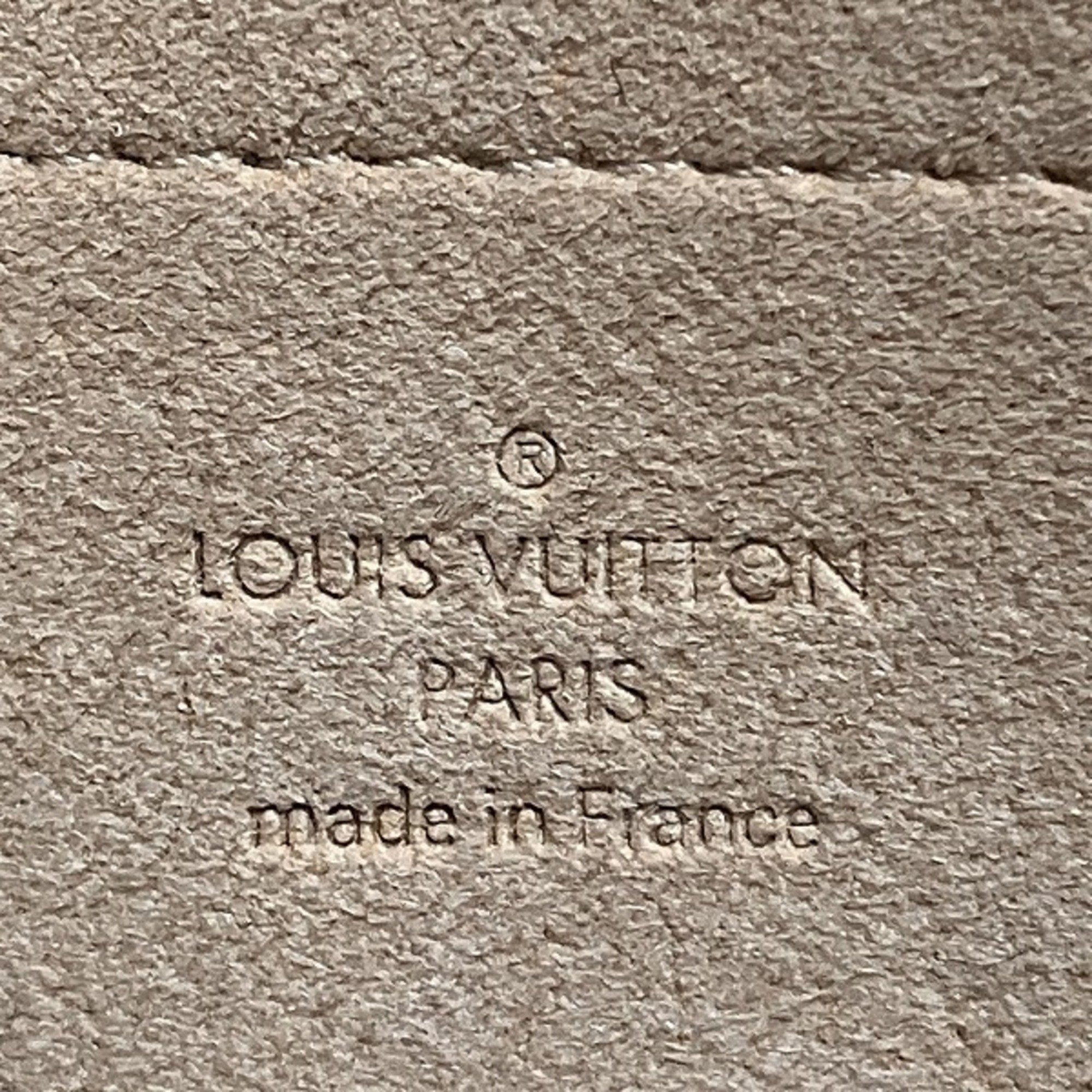 Louis Vuitton Mira  Canvas Clutch Bag