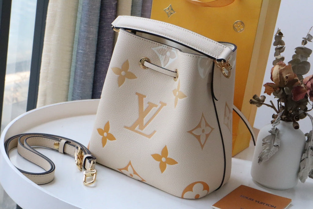 Louis Vuitton NeoNoe Bucket Bag Monogram Empreinte Cream/Saffron For Women, WomenÃƒÂ¢Ã¢â€šÂ¬Ã¢â€žÂ¢s Bags, Shoulder Bags 7.9in/20cm Louis Vuitton M45716