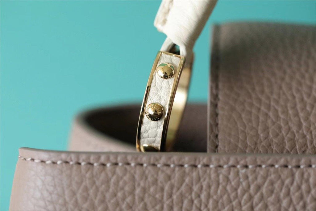 Louis Vuitton Capucines MM Taurillon Smokey Brown Green/ Creme/ Pink For Women, WomenÃƒÂ¢Ã¢â€šÂ¬Ã¢â€žÂ¢s Bags, Shoulder And Crossbody Bags 12.4in/31.5cm Louis Vuitton M59516
