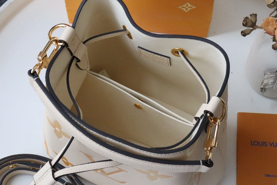 Louis Vuitton NeoNoe BB Bucket Bag Monogram Empreinte Cream/Saffron For Women, Women’s Bags, Shoulder Bags 7.9in/20cm Louis Vuitton M45716