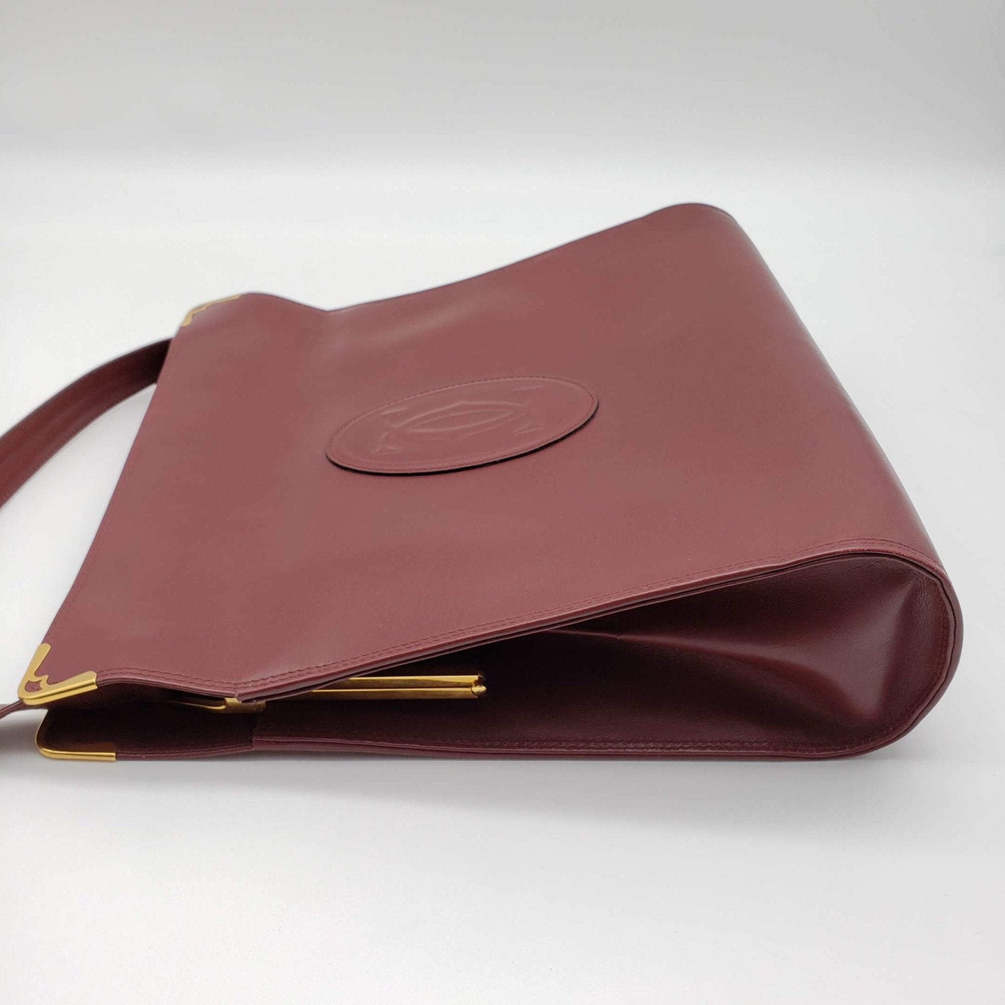 Cartier Gold Leather Clutch Bag