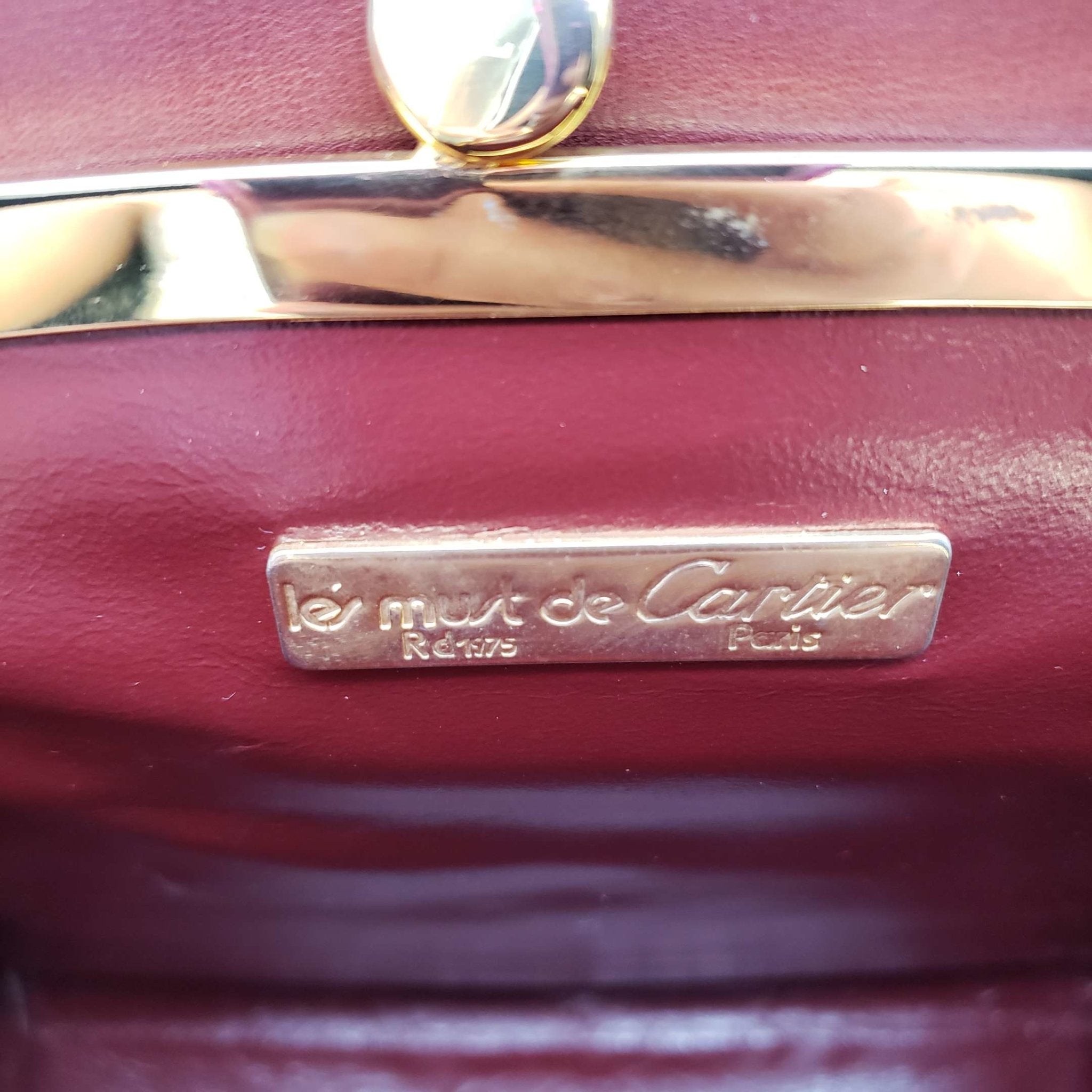 Cartier Gold Leather Clutch Bag