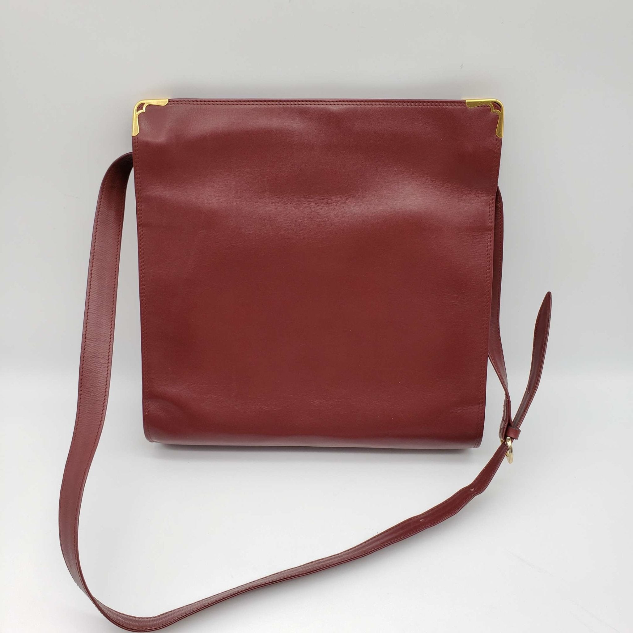 Cartier Gold Leather Clutch Bag
