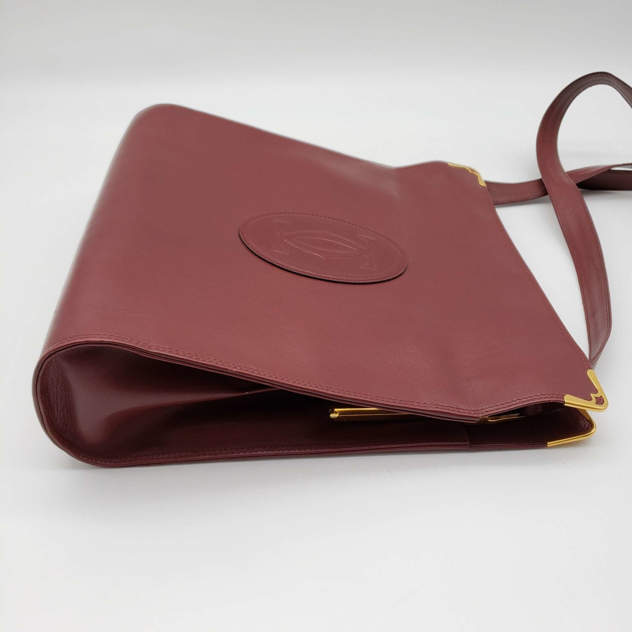 Cartier Gold Leather Clutch Bag
