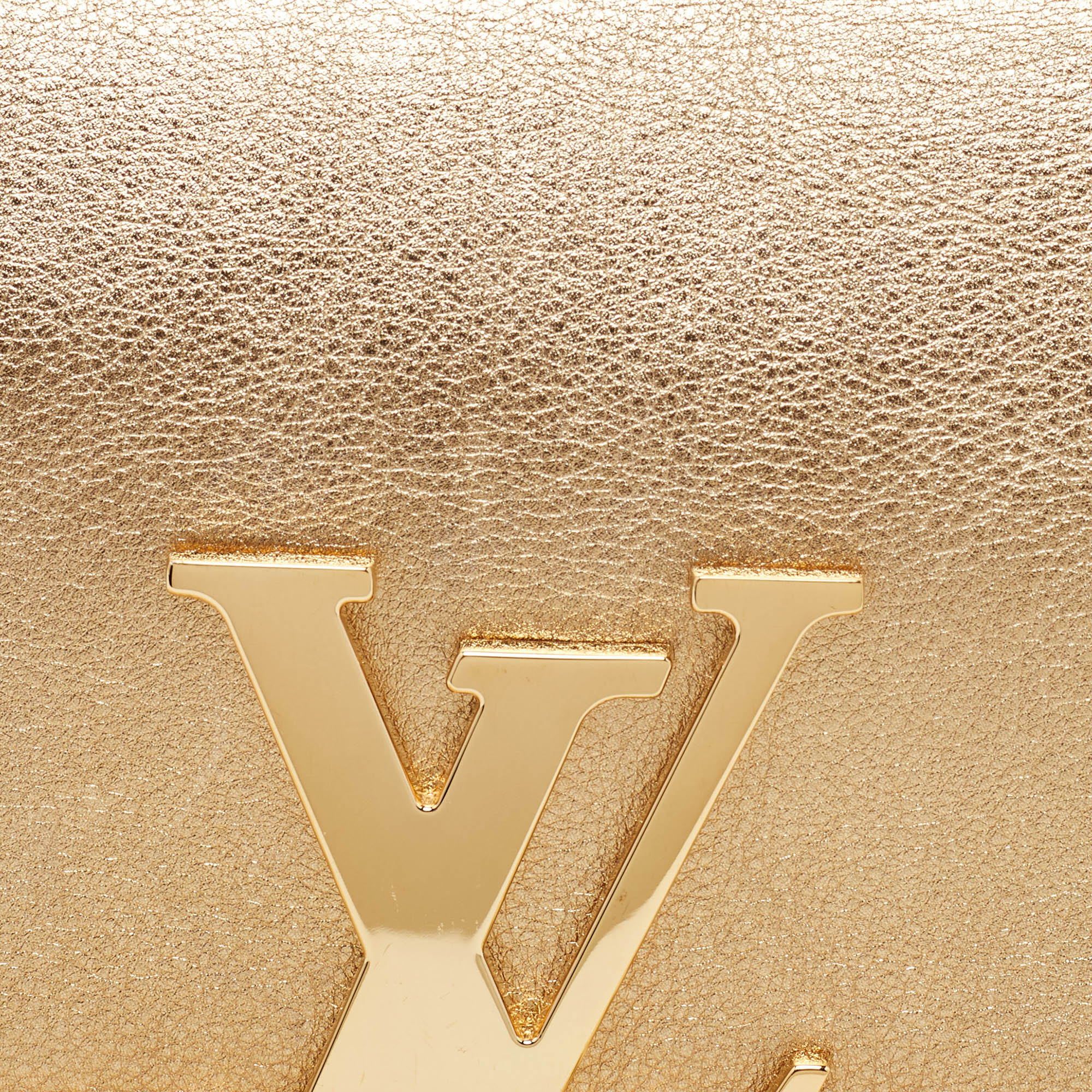 Louis Vuitton  Gold Leather Louise Clutch