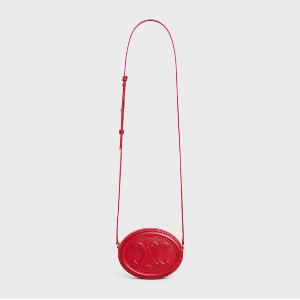OVAL SHOULDER BAG IN TRIOMPHE