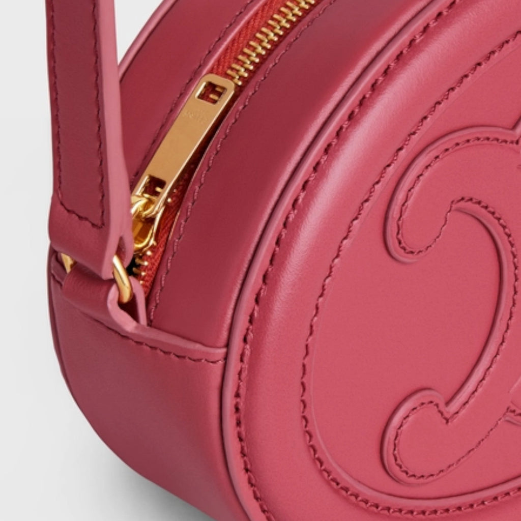 OVAL SHOULDER BAG IN TRIOMPHE