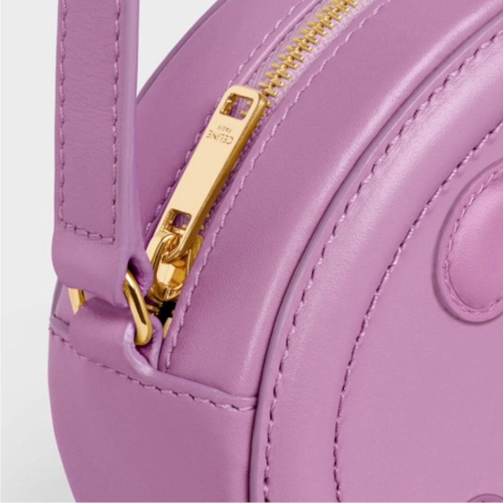 OVAL SHOULDER BAG IN TRIOMPHE