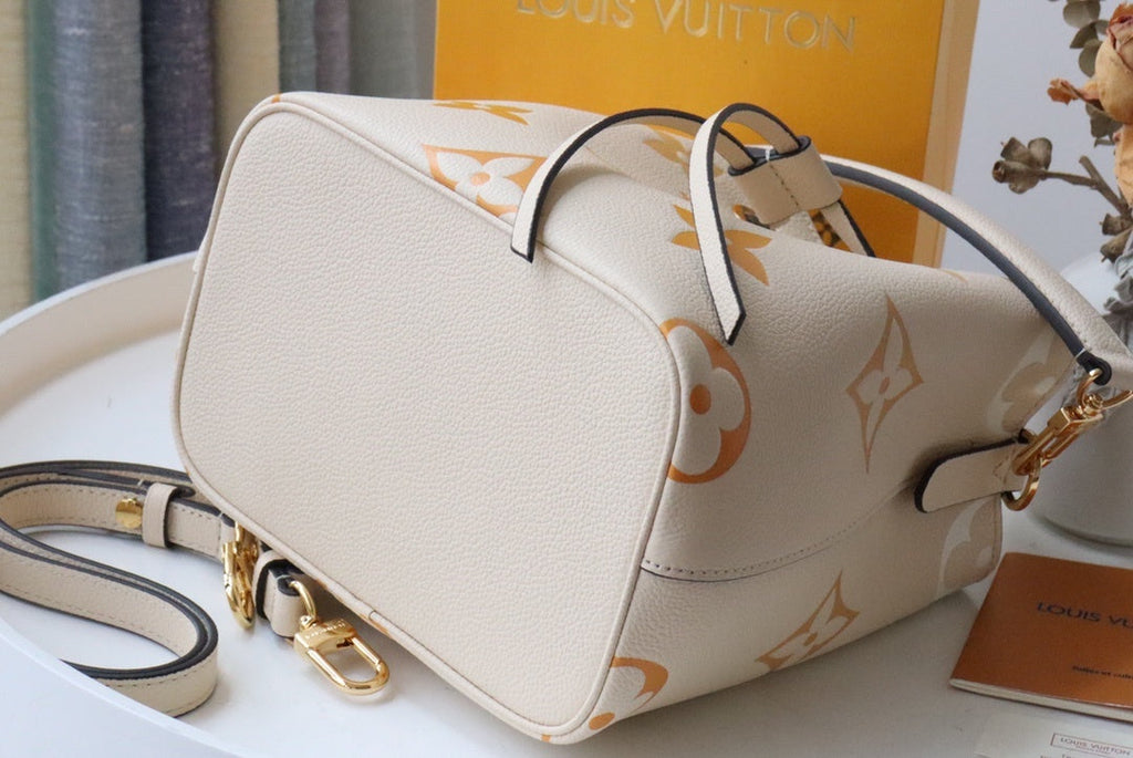 Louis Vuitton NeoNoe BB Bucket Bag Monogram Empreinte Cream/Saffron For Women, Women’s Bags, Shoulder Bags 7.9in/20cm Louis Vuitton M45716