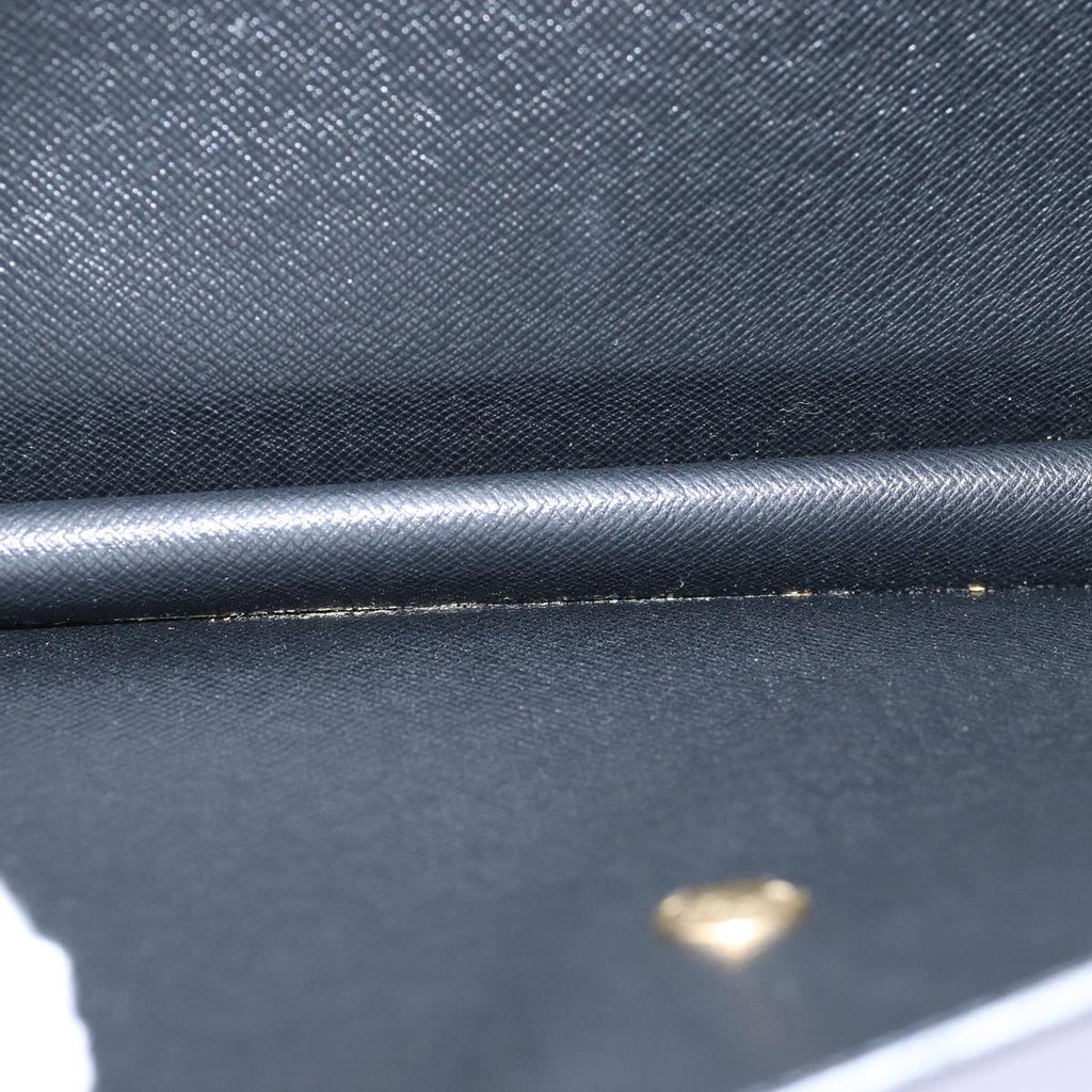 Louis Vuitton Montaigne Clutch Bag