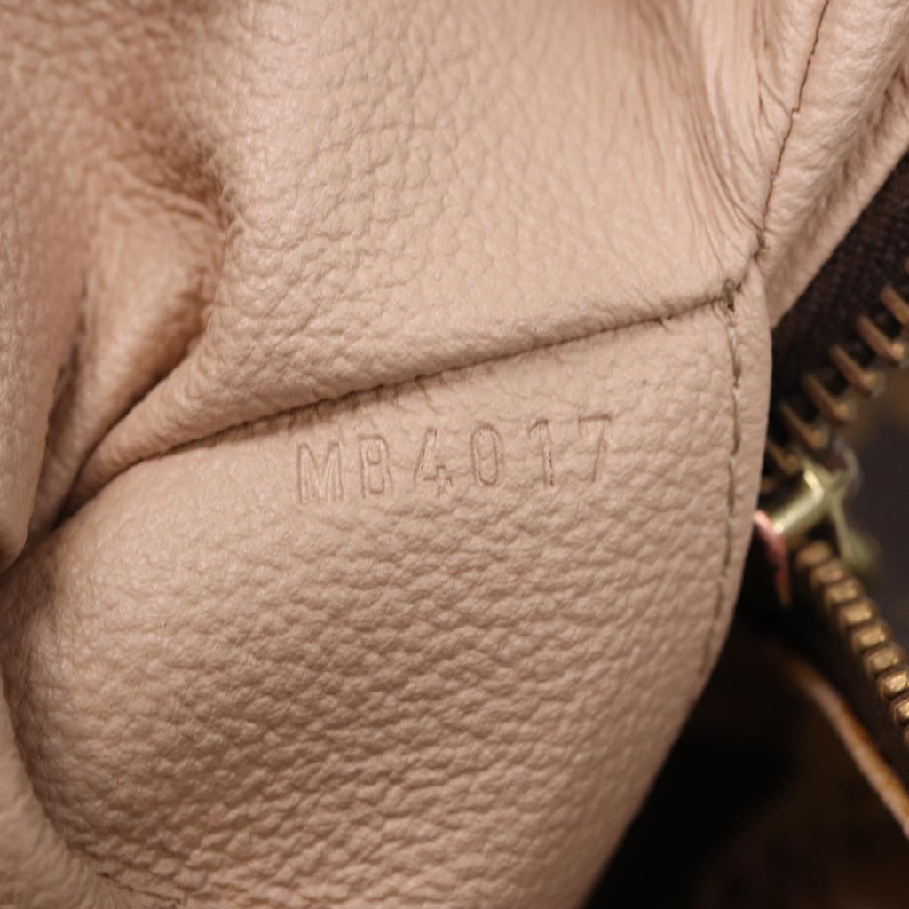 Louis Vuitton Trousse De Toilette Clutch Bag