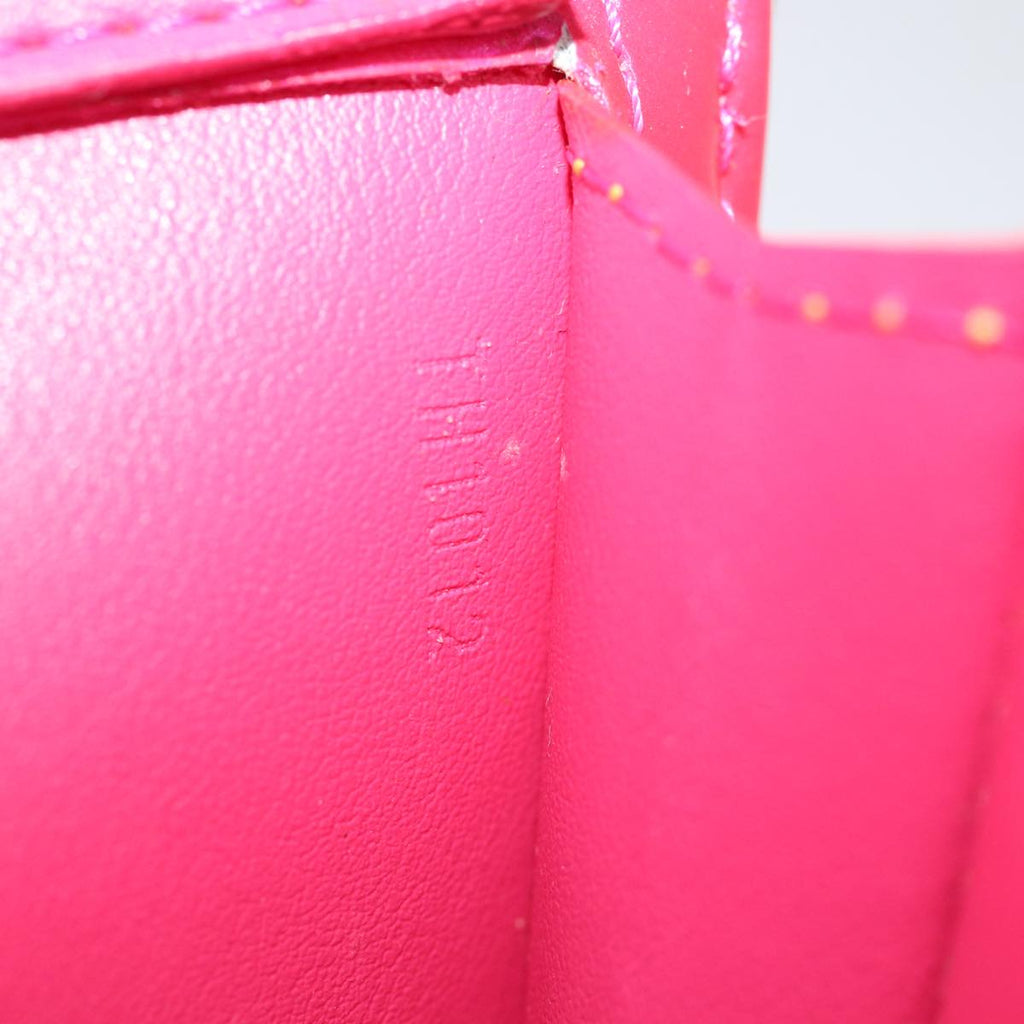 Louis Vuitton Mott   Leather Clutch Bag