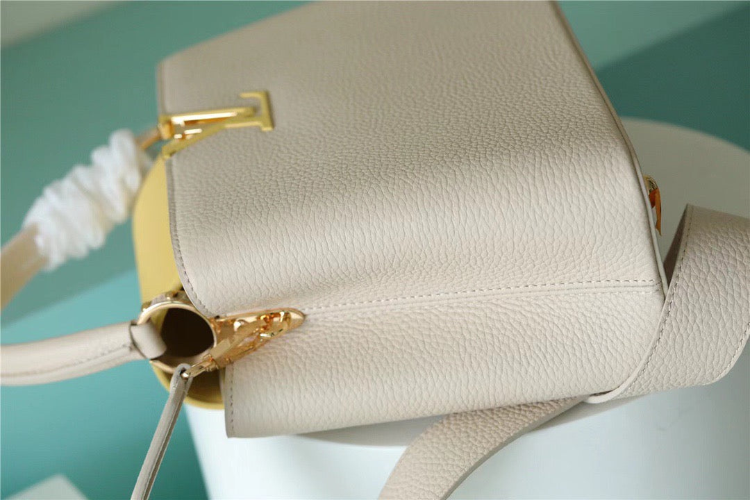 Louis Vuitton Capucines Taurillon Creme Beige/ Plume Yellow Berlingot For Women, WomenÃƒÂ¢Ã¢â€šÂ¬Ã¢â€žÂ¢s Bags, Shoulder And Crossbody Bags 10.6in/27cm Louis Vuitton