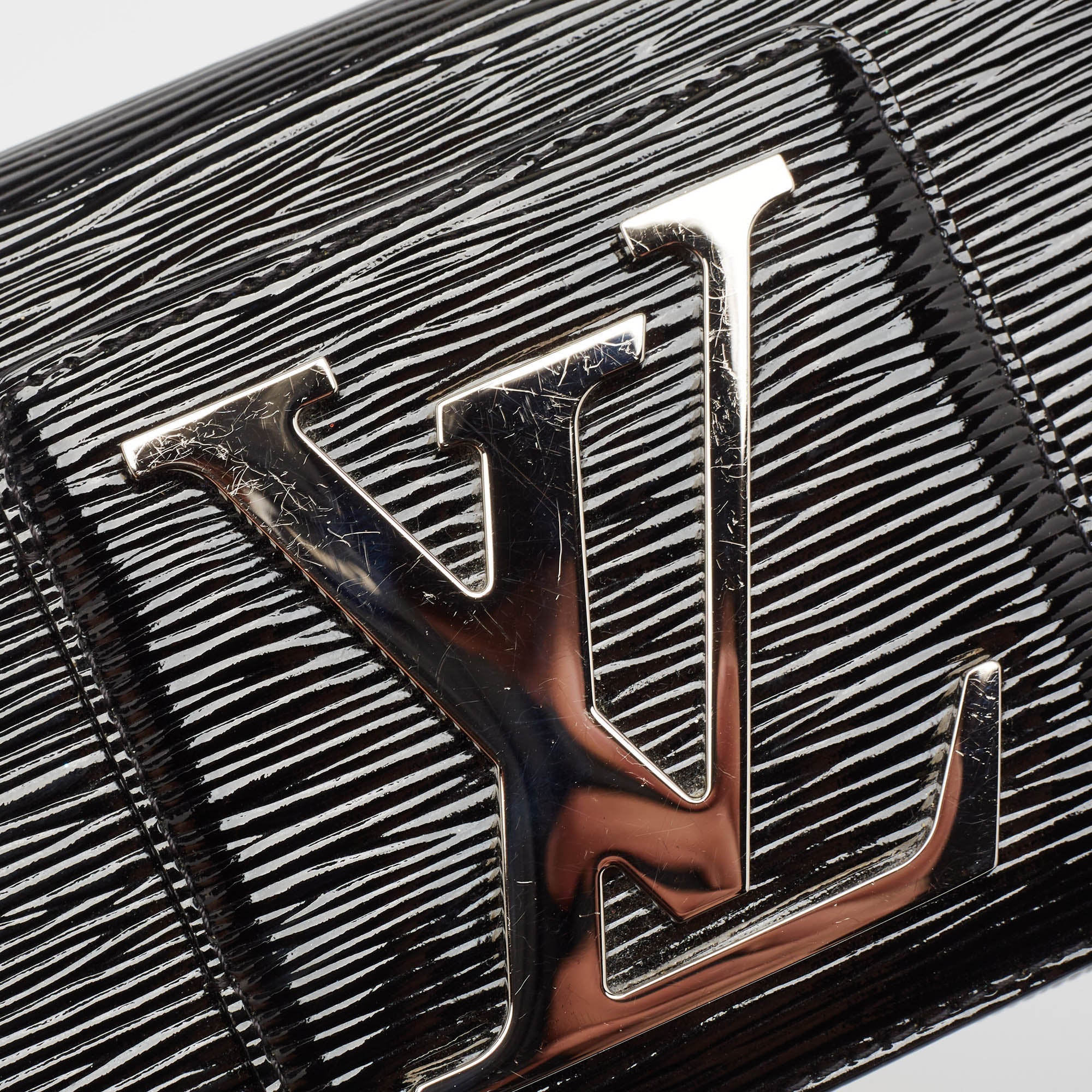 Louis Vuitton Black Electric Epi Leather Sobe Clutch..