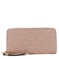 LOUIS VUITTON Clemence Empreinte Leather Wallet Dusty Pink