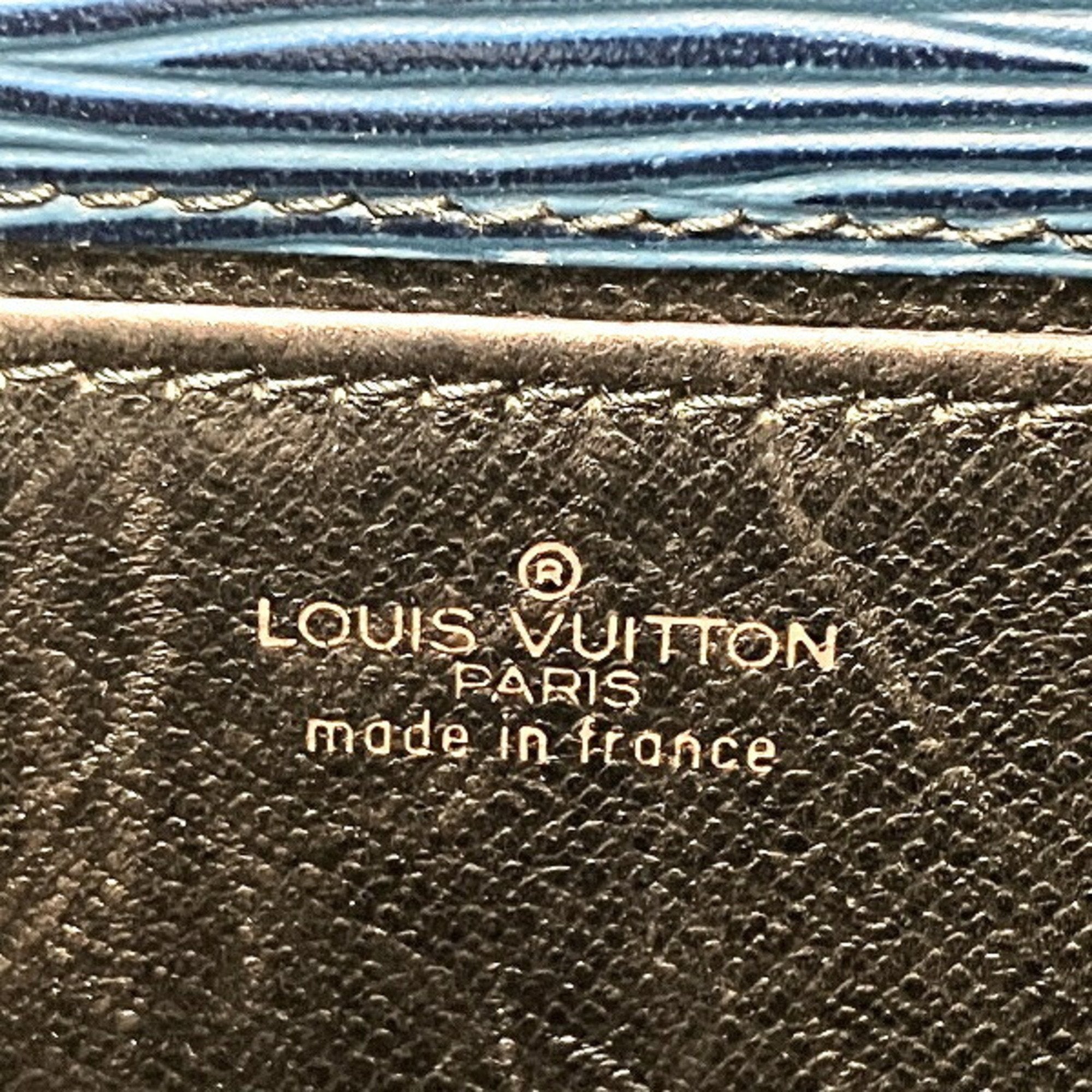Louis Vuitton Jena  Leather Clutch Bag