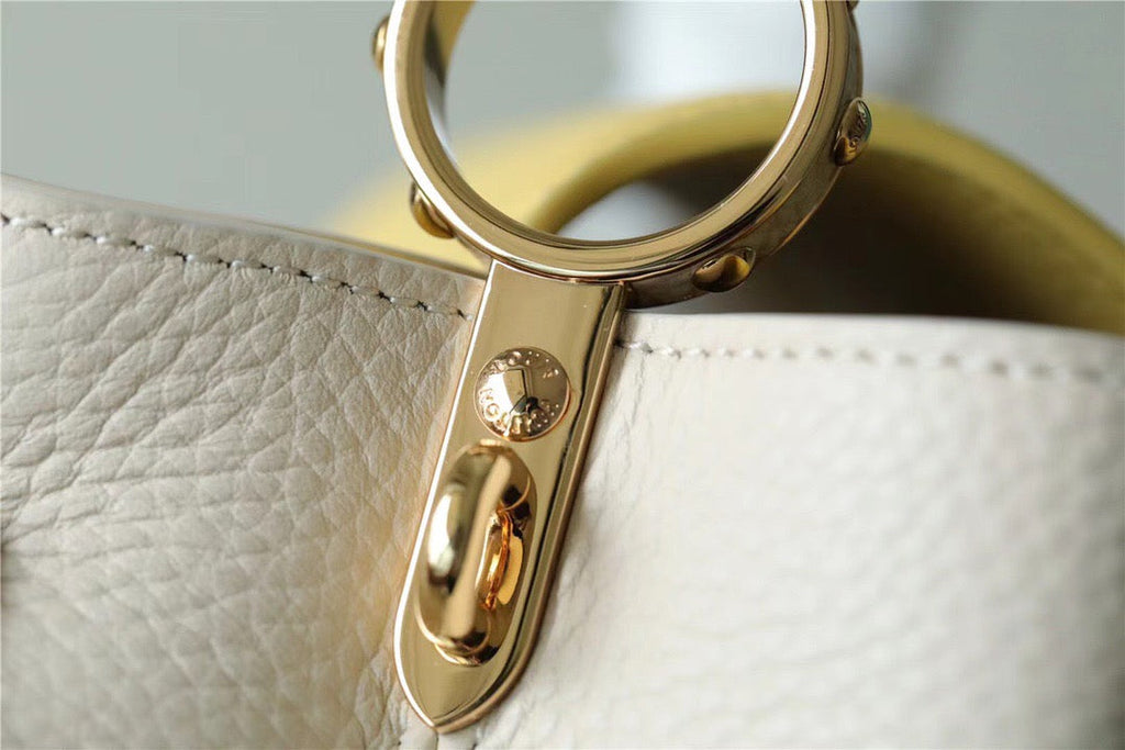 Louis Vuitton Capucines Taurillon Creme Beige/ Plume Yellow Berlingot For Women, WomenÃƒÂ¢Ã¢â€šÂ¬Ã¢â€žÂ¢s Bags, Shoulder And Crossbody Bags 10.6in/27cm Louis Vuitton