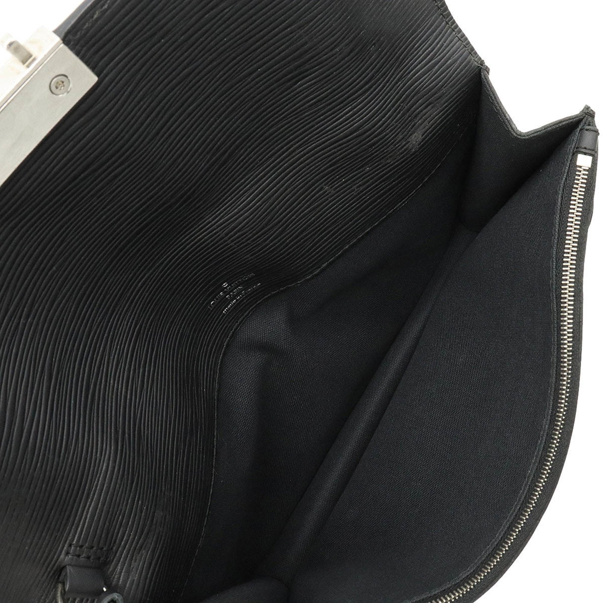 Louis Vuitton Taiga  Leather Clutch Bag