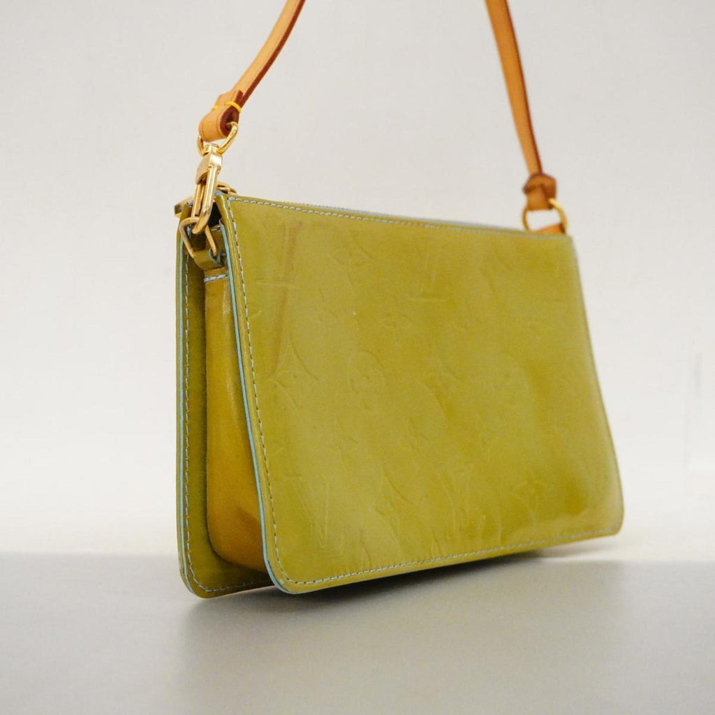 Louis Vuitton Lexington   Leather Clutch Bag