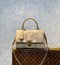 M46041 Madeleine 24cm/BB 30cm/MM Monogram Empreinte grey Handbag