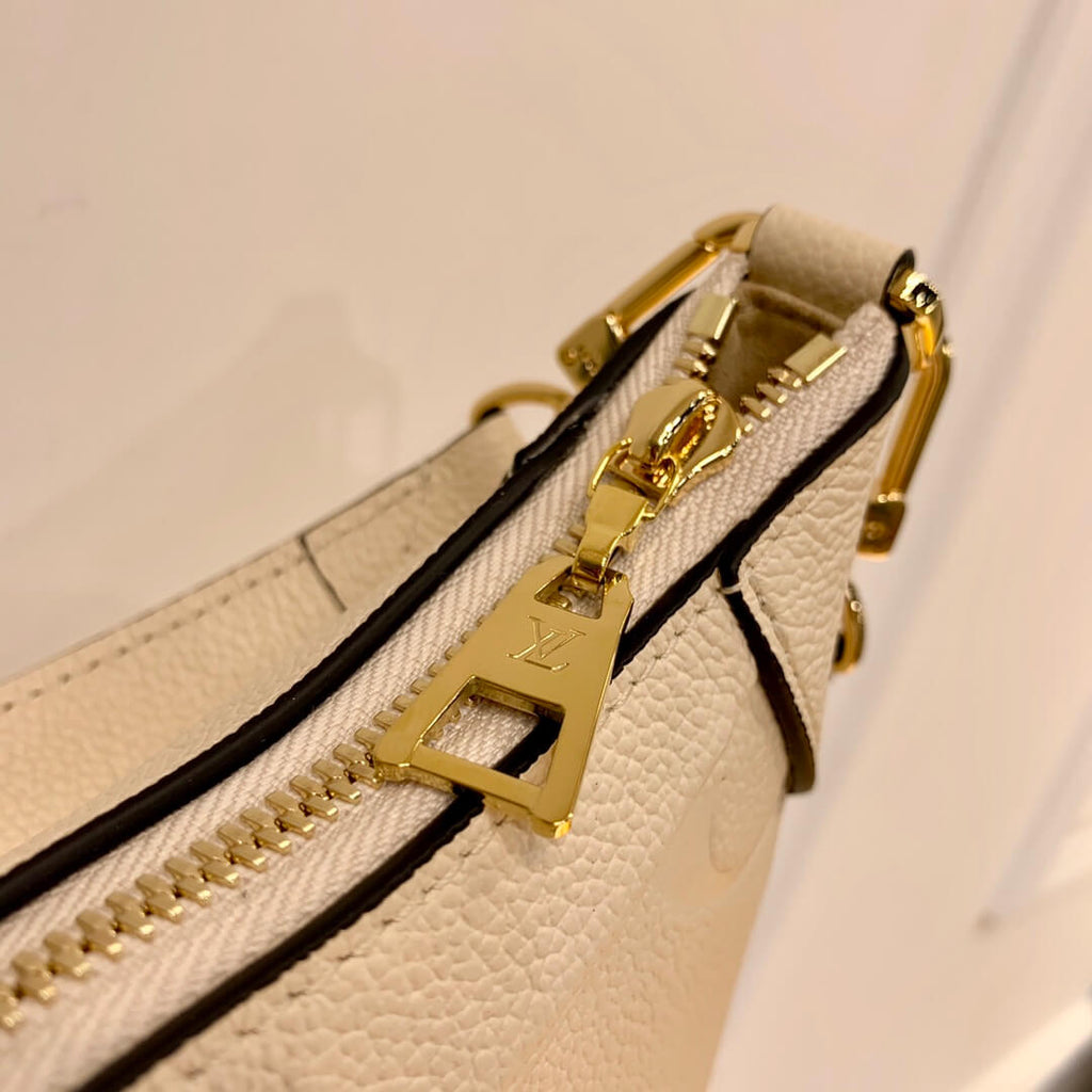 M46099 Bagatelle Monogram Empreinte milk white 22cm
