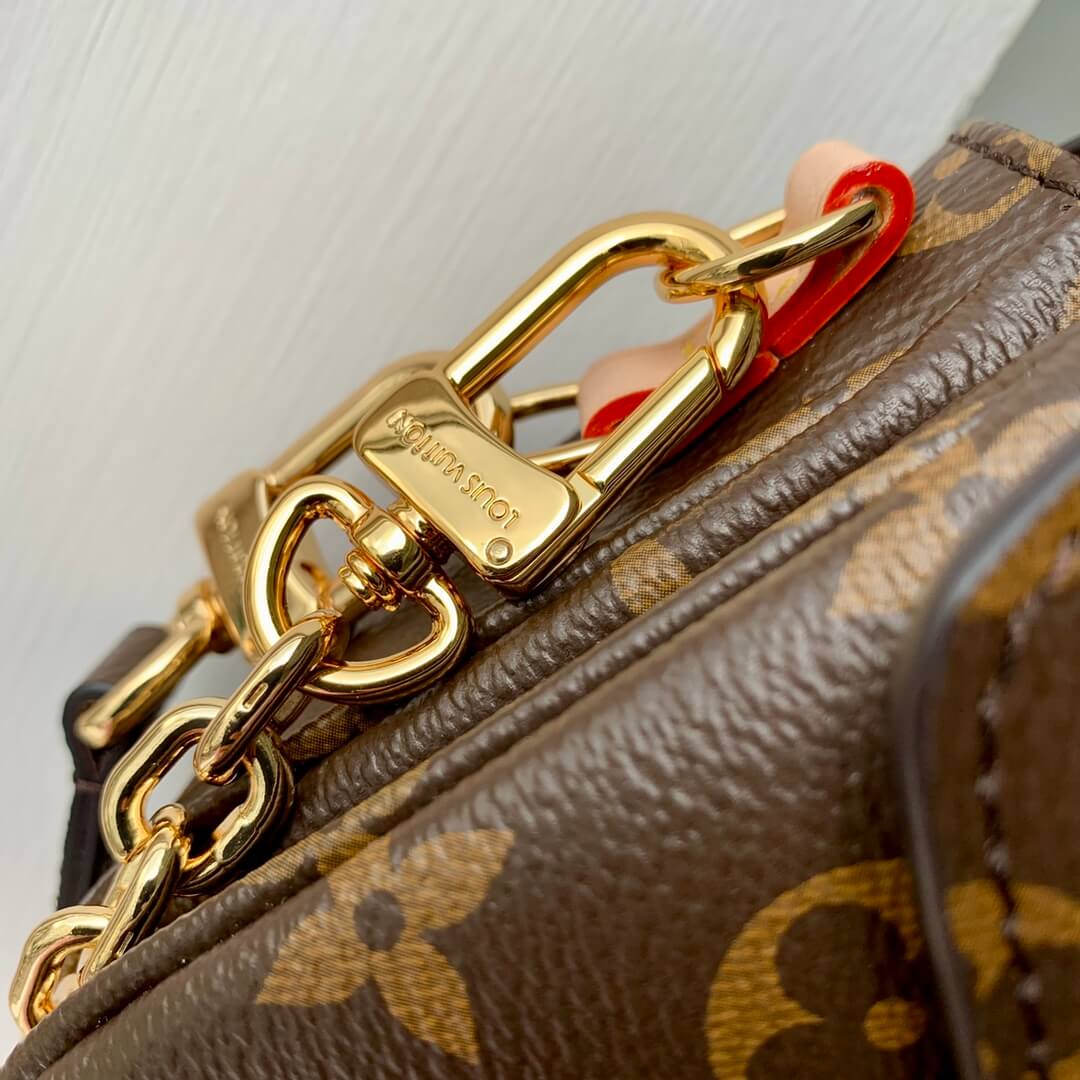 M46279 messenger bag East West Métis monogram 21.5cm brown