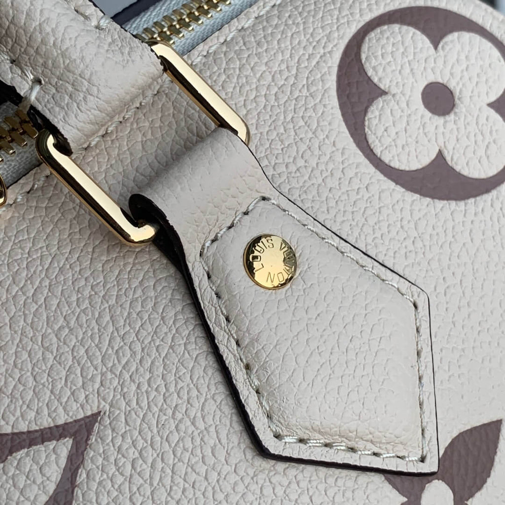 M58947 Speedy Bandoulière 25 Monogram Empreinte white