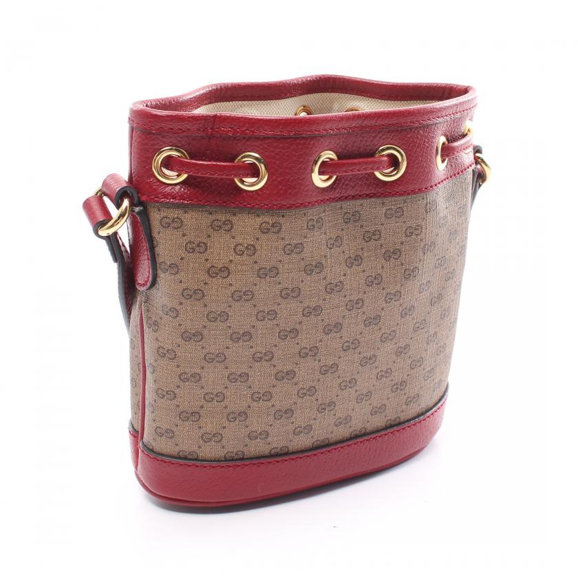 Gucci ÃƒÆ’Ã¢â‚¬â€ Doraemon Mini Bucket Bag in Multicolor PVC Leather - Micro GG Supreme Light Brown Shoulder Bag