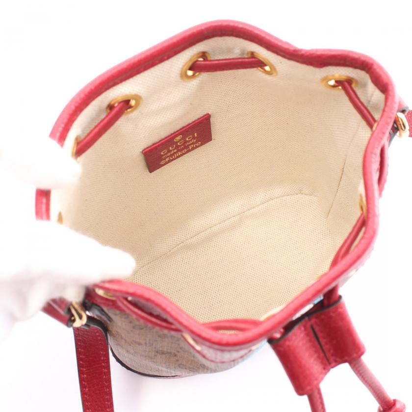 Gucci ÃƒÆ’Ã¢â‚¬â€ Doraemon Mini Bucket Bag in Multicolor PVC Leather - Micro GG Supreme Light Brown Shoulder Bag